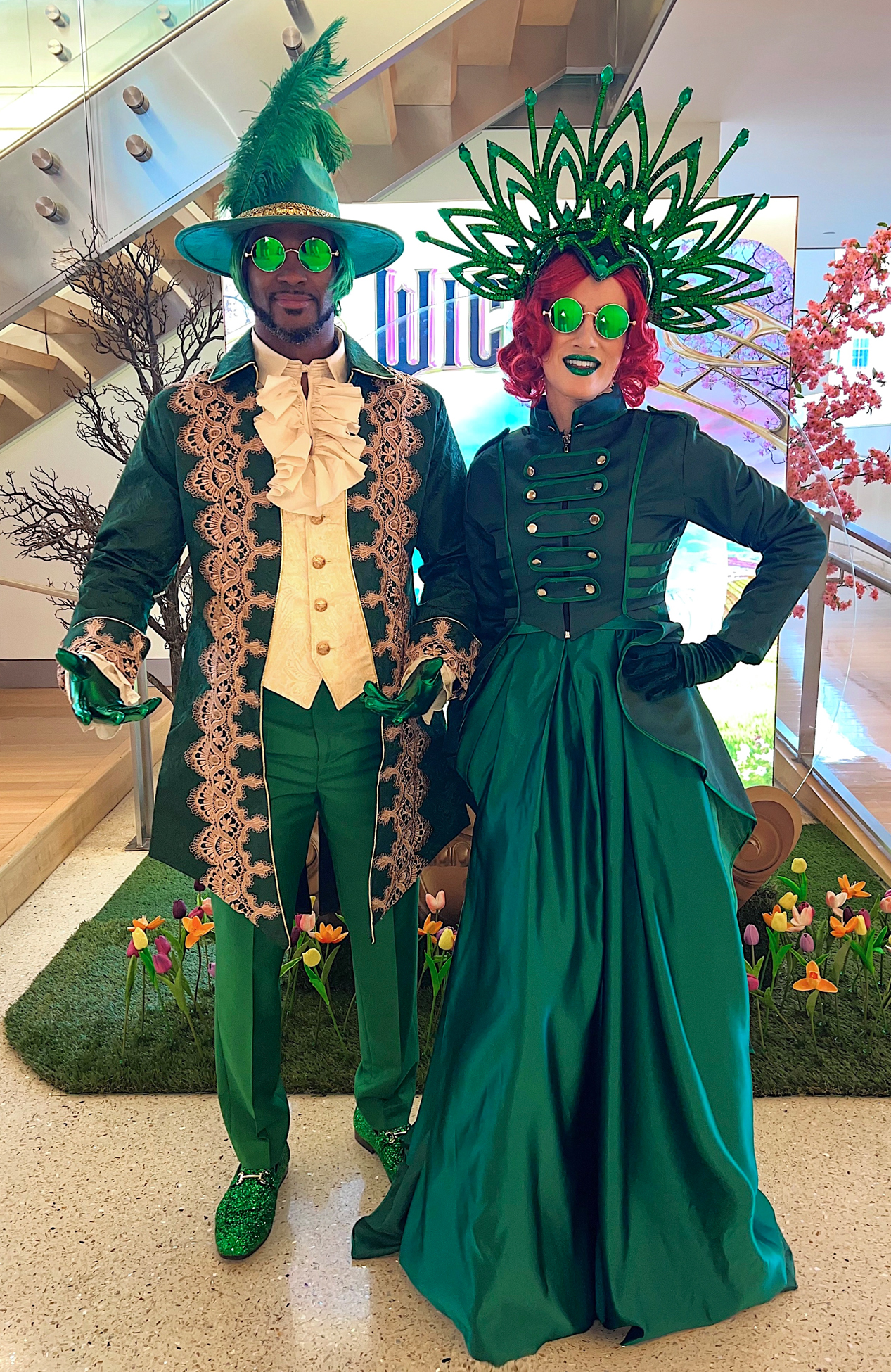 Wicked characters greeting guests at a movie premiere