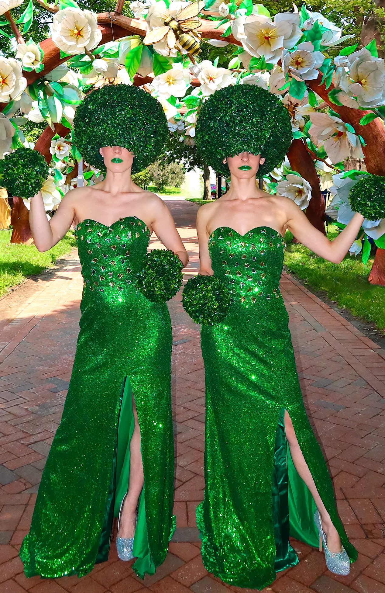 Topiary greeters at a garden event